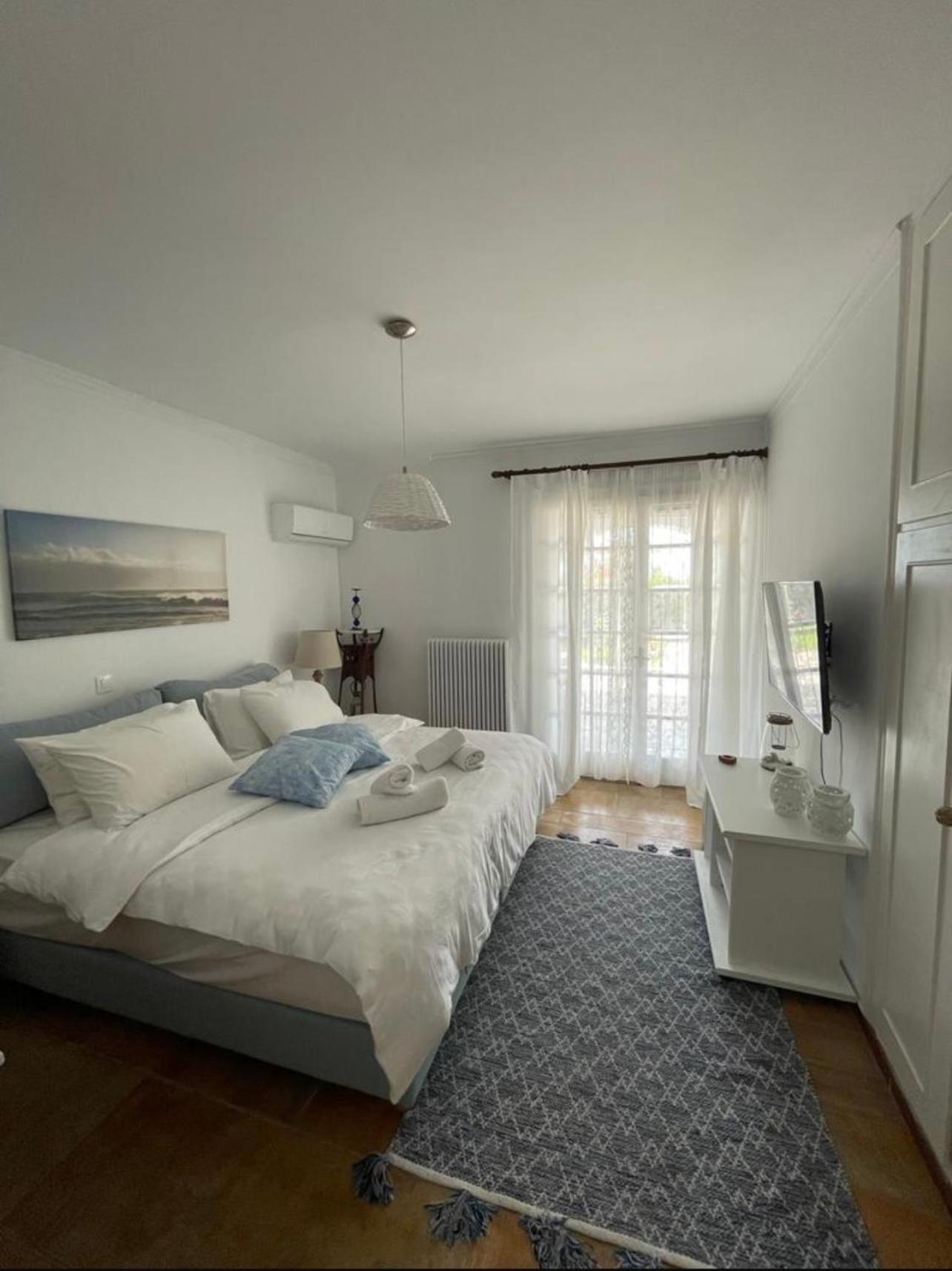Villa Sarwnisland Lagonisi Esterno foto